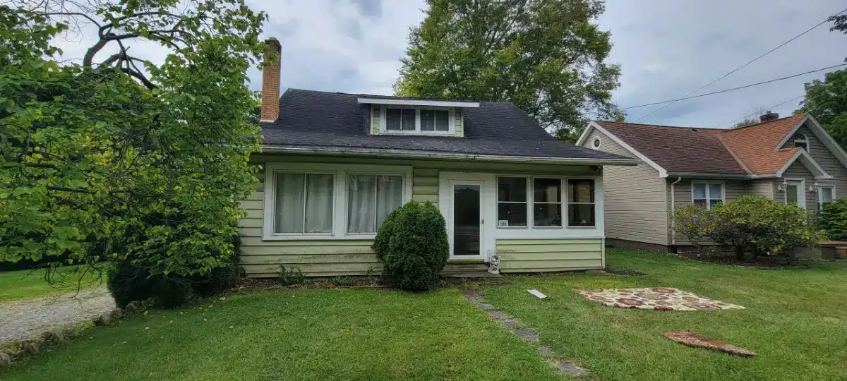 roof-insurance-home-commercial-pennsylvania Residential home roof used to illustrate insurance coverage for roof repairs